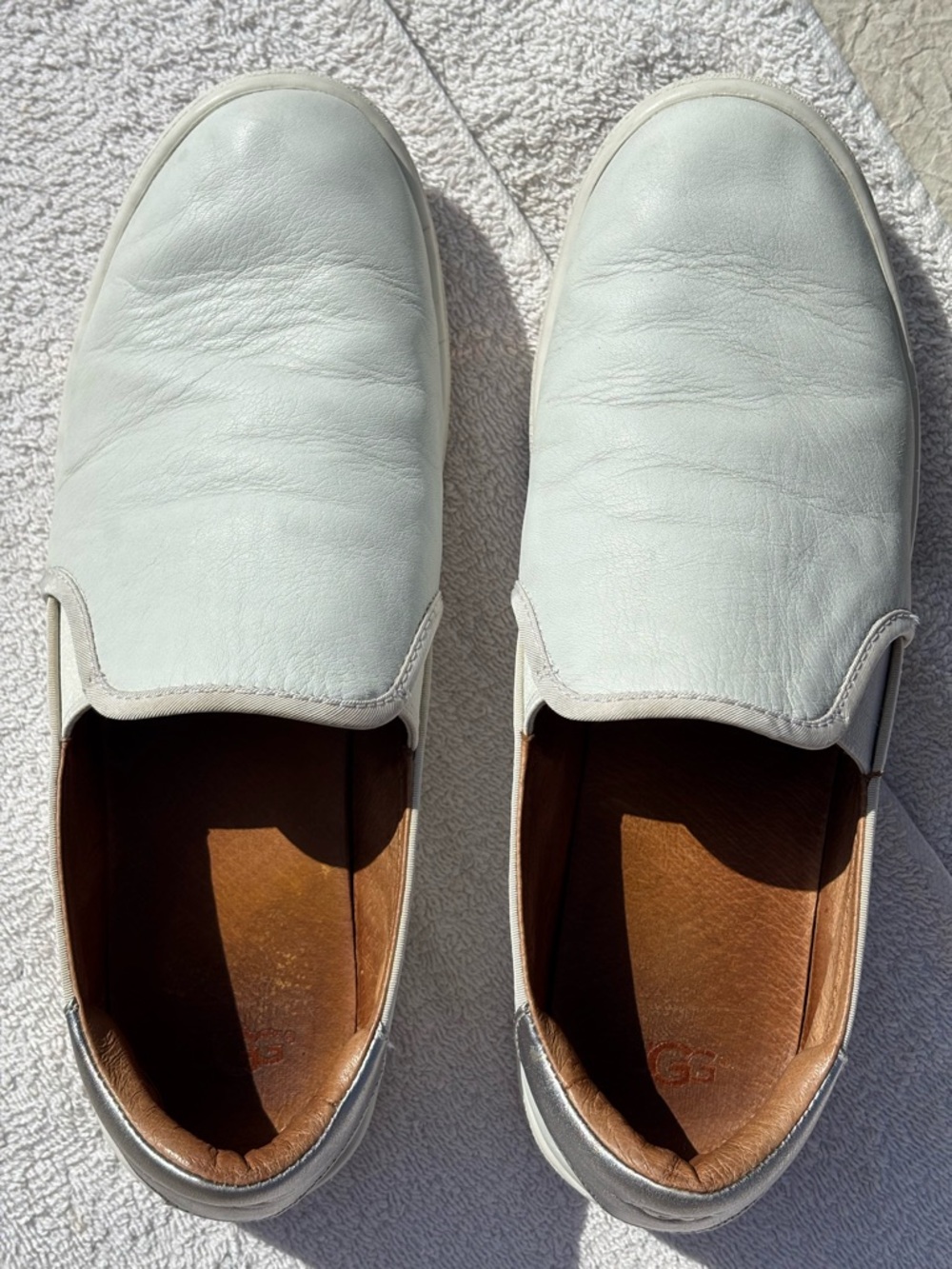 UGG Womens Slip-On Loafers in off white.